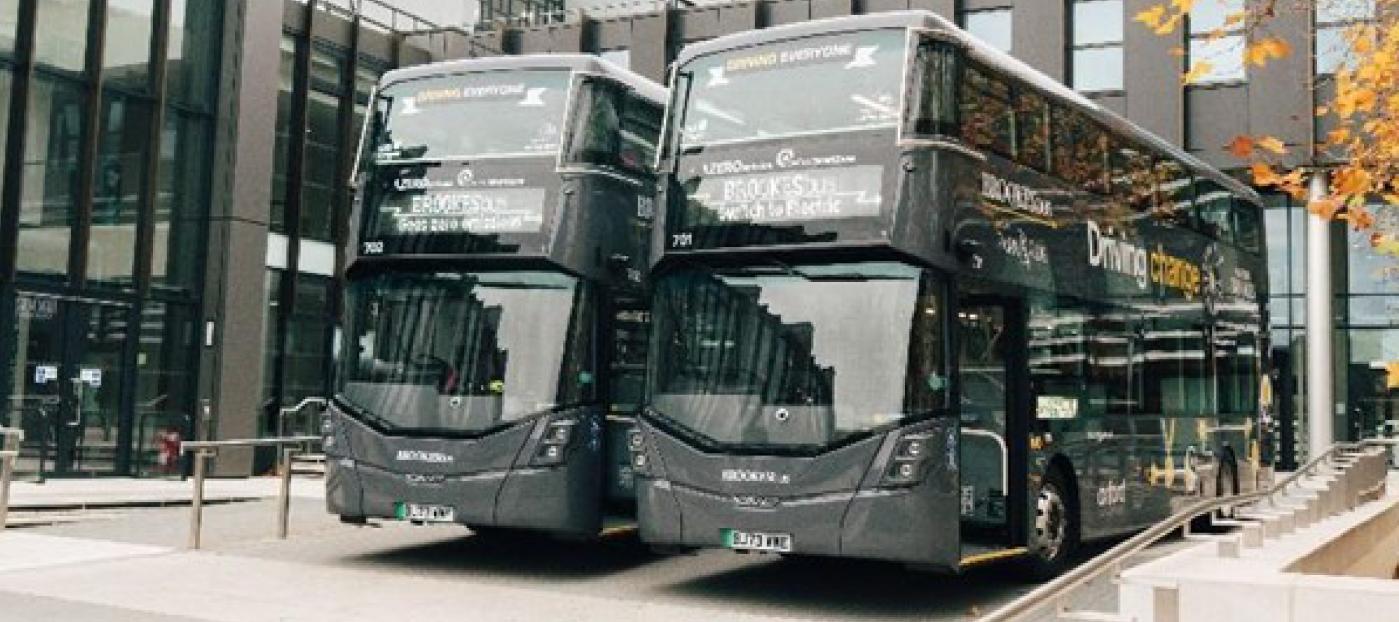 two grey battery electric double deck buses 